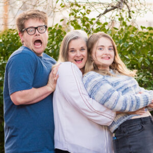 Kathleen, her son, and daughter being goofy